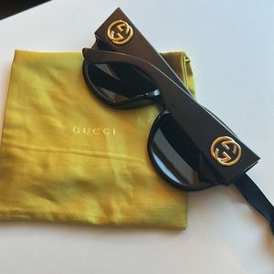 Gucci sunglasses - large black frame. Cloth case included.